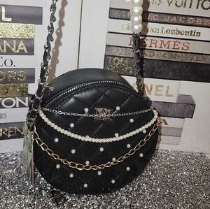 Badgley Mischka round black diamond quilted crossbody